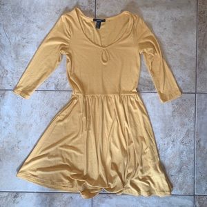 Gold dress with quarter length sleeves
